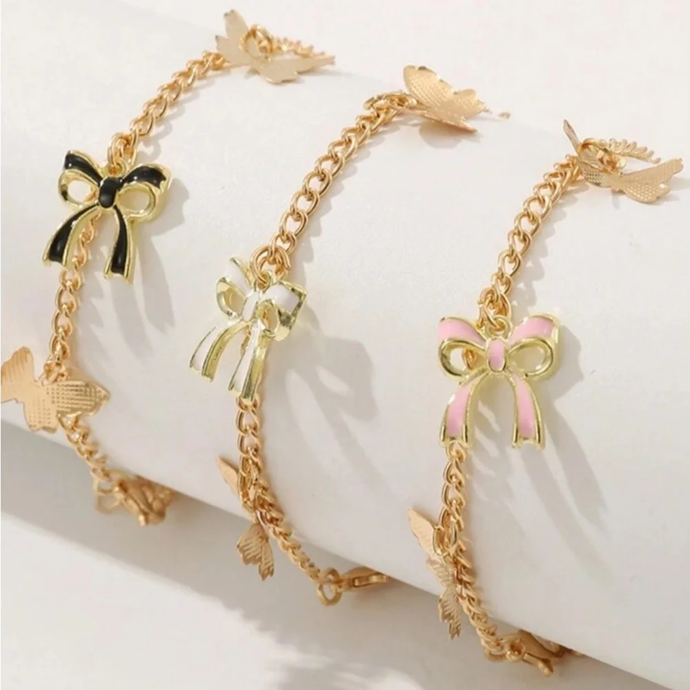 Gold Bow Charm Bracelets - Picture 1 of 5